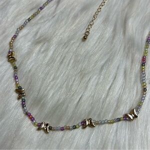 Dainty butterfly seed bead necklace